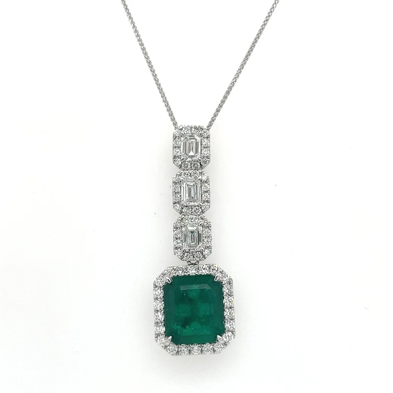 Affordable Luxury Jewelry For Every Occasion Bremer Jewelry 18K White Gold Emerald Shape Emerald and Diamonds Drop Pendant with a 18K White Gold Rope Chain (6.24ctw)